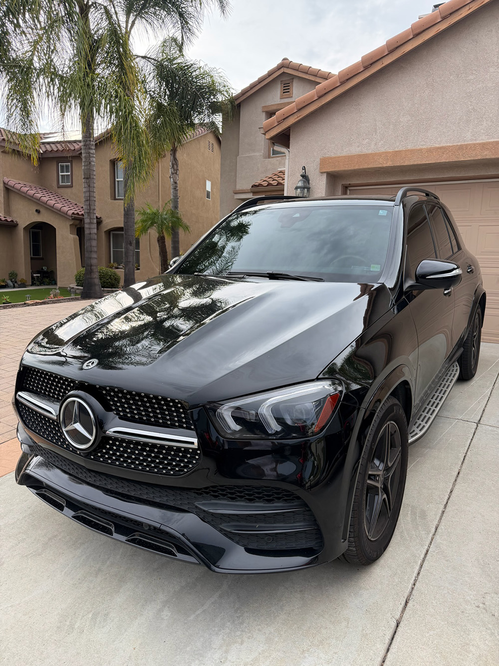 Black Mercedes GLE with a fresh ceramic coating finish, mobile detailing job in the Chula Vista area