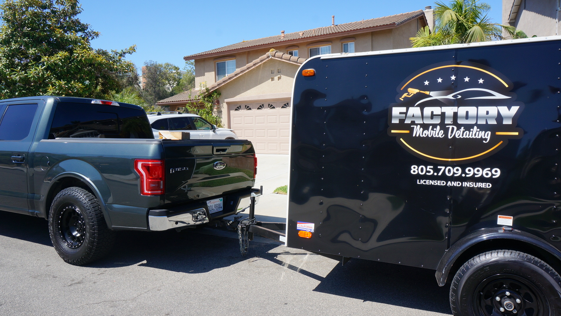 Factory Mobile Detailing truck and trailer setup arriving for a job in Chula Vista