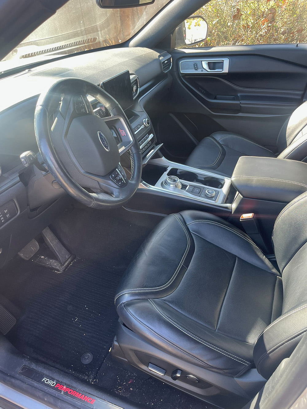 Ford Explorer black leather interior after a full detailing service