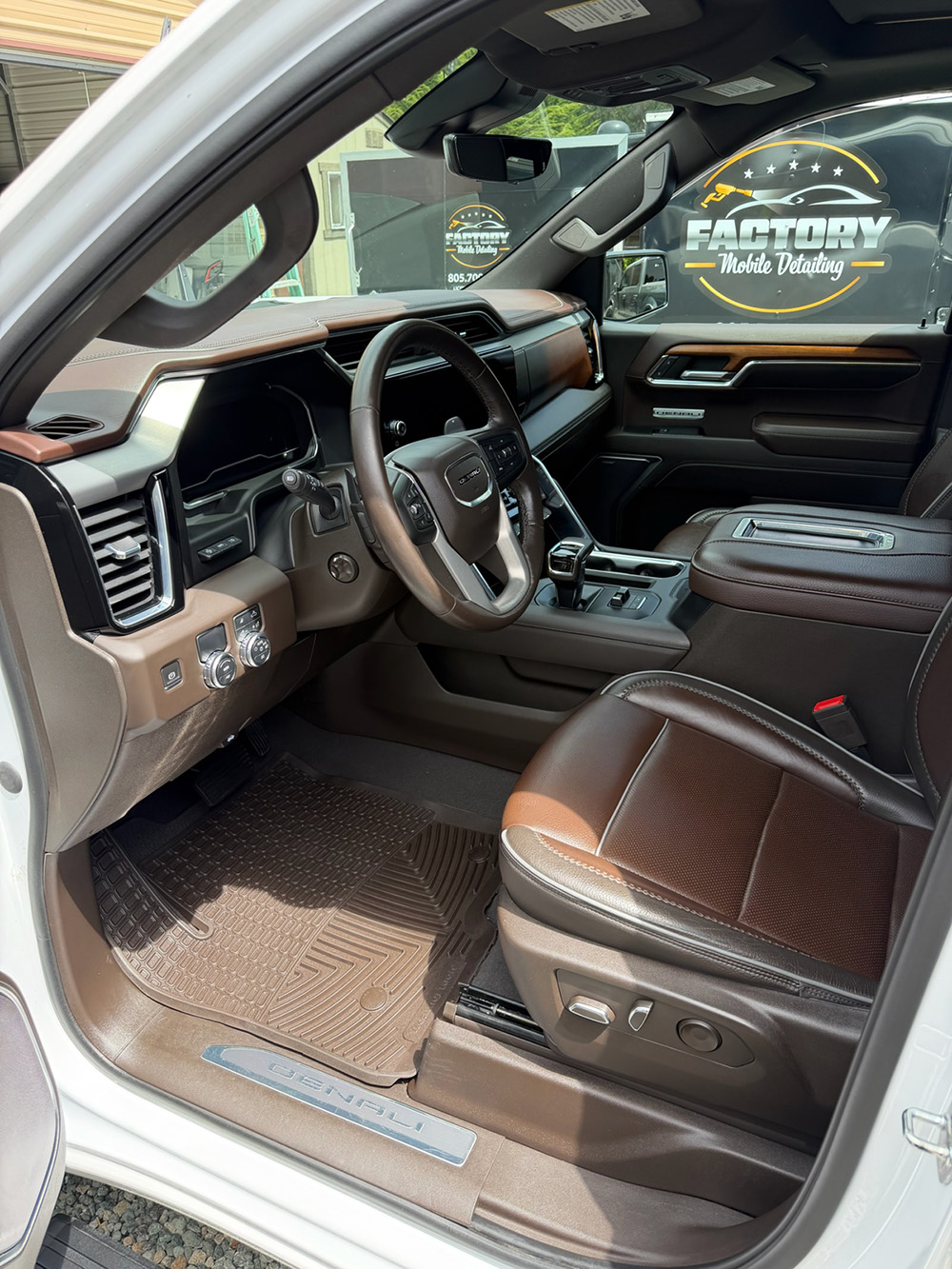 GMC Yukon Denali leather interior after a full detail, clean seats and door panels