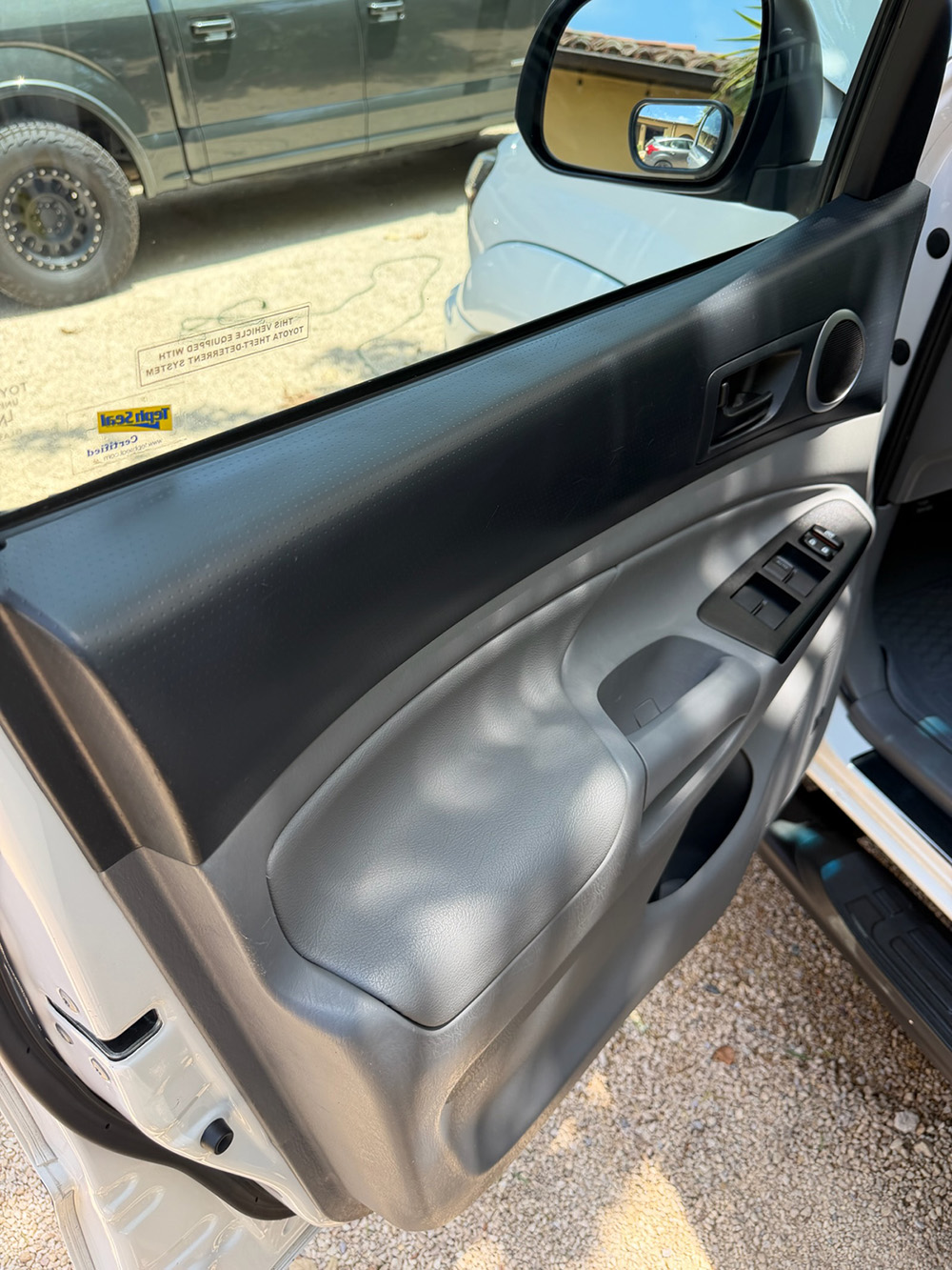 Toyota interior door panel cleaned and detailed during an interior service